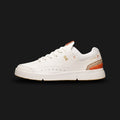 ON THE ROGER Centre Court shoes in White and Flame (3MD11270256). Features a premium vegan leather upper, hidden CloudTec cushioning technology, a responsive Speedboard overlay, and subtle orange accents. Luxuntique guarantees 100% authentic footwear.