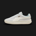 PUMA GV Special sneakers for women in PUMA White and Warm White (401385_01). Features a premium tumbled leather upper, breathable perforated toe box, signature Formstrip, and a chunky retro cushioned midsole. Luxuntique guarantees 100% authentic footwear.