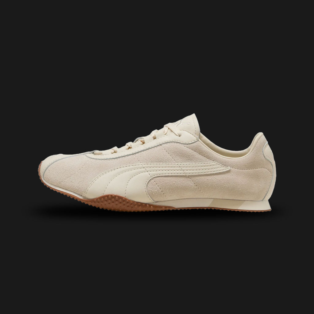 PUMA H-Street Premium Unisex sneakers in Alpine Snow, Warm White, and Gum (403777_02). Features a premium multi-material upper with soft leather and suede in monochromatic off-white tones. Ultra-thin racing-inspired midsole with a signature wrap-around textured gum rubber outsole for grip. A 2003 archival revival. Luxuntique offers 100% authentic PUMA in Sri Lanka.