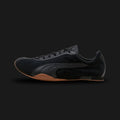 PUMA H-Street Premium Unisex sneakers in PUMA Black, Shadow Gray, and Gum (403777_03). Features a premium multi-material leather and suede upper in matte black and dark gray with an ultra-thin racing-inspired midsole. Signature wrap-around textured gum rubber outsole for grip. A 2003 archival revival. Luxuntique offers 100% authentic PUMA in Sri Lanka.