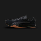 PUMA H-Street Premium Unisex sneakers in PUMA Black, Shadow Gray, and Gum (403777_03). Features a premium multi-material leather and suede upper in matte black and dark gray with an ultra-thin racing-inspired midsole. Signature wrap-around textured gum rubber outsole for grip. A 2003 archival revival. Luxuntique offers 100% authentic PUMA in Sri Lanka.