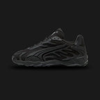 PUMA Inhale Tech Street X unisex sneakers in Puma Black and Puma Silver (Design Code: 402869-01). Featuring a breathable mesh upper with signature "flame" synthetic overlays in metallic silver. Includes a cushioned midsole for Y2K-era comfort and a durable rubber outsole for traction. Luxuntique offers 100% authentic PUMA lifestyle sneakers at the lowest price in Sri Lanka.