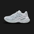 Puma Inverse Premium women's sneakers in Platinum Gray, Silver Mist, and Cool Mid Gray (401756_02). Features a sophisticated, multi-layered tech-runner silhouette blending premium leather, suede overlays, and breathable mesh. Includes striking Silver Mist metallic accents, a chunky sculpted midsole for modern styling, and a durable rubber outsole. Luxuntique guarantees 100% authentic Puma footwear in Sri Lanka.