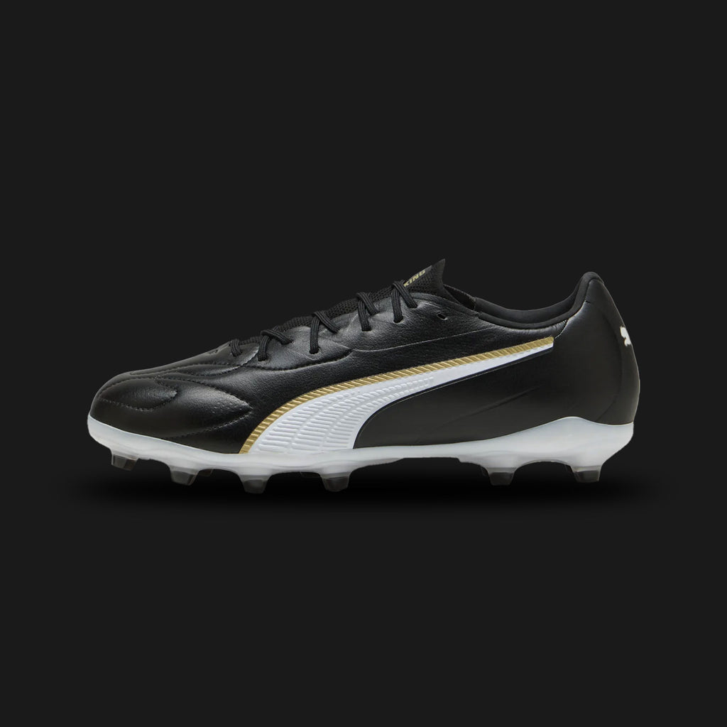 Puma King 20 Match FG/AG unisex football boots in Puma Black, Puma White, and Puma Gold (108465_02). Features a supple, premium black synthetic upper designed for classic ball touch and control. Includes a crisp White Puma formstrip, regal Puma Gold branding, a comfortable standard tongue construction, and a lightweight TPU outsole with conical studs for Firm Ground and Artificial Ground. Luxuntique guarantees 100% authentic Puma footwear in Sri Lanka.