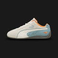 PUMA McLaren Racing Speedcat Unisex sneakers in Warm White and Seafoam (309452_03). Features a premium soft white leather upper with seafoam green accents and the official McLaren Racing logo on the tongue. Low-profile tire-tread rubber outsole and rounded driver's heel. Luxuntique offers 100% authentic PUMA in Sri Lanka.