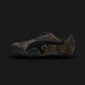 Puma Mostro Camo unisex sneakers in Wild Willow and Dark Olive (401540_03). Features the iconic low-profile, avant-garde design with a distinctive camouflage print on a premium upper. Includes the signature strap closure for a secure fit, a lightweight cushioned midsole, and a unique spike-patterned rubber outsole for exceptional grip and retro-futuristic street style. Luxuntique guarantees 100% authentic Puma footwear in Sri Lanka.