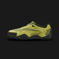 Puma Mostro XC Mesh unisex sneakers in Kiwi Green and Puma Black (405315_02). Features an avant-garde Y2K silhouette with a breathable Kiwi Green mesh upper and a distinct asymmetrical closure system. Includes stark Puma Black overlays and the signature Mostro spiked rubber outsole wrapping the heel and toe. Luxuntique guarantees 100% authentic Puma footwear in Sri Lanka.