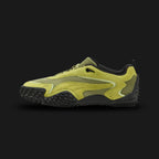 Puma Mostro XC Mesh unisex sneakers in Kiwi Green and Puma Black (405315_02). Features an avant-garde Y2K silhouette with a breathable Kiwi Green mesh upper and a distinct asymmetrical closure system. Includes stark Puma Black overlays and the signature Mostro spiked rubber outsole wrapping the heel and toe. Luxuntique guarantees 100% authentic Puma footwear in Sri Lanka.