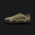 Puma Mostro XC Prime unisex sneakers in Lux Army and Loden Green (404336_05). Features a hybrid, trail-inspired design that elevates the classic Mostro silhouette with a rugged, technical aesthetic. Includes premium leather and textile upper construction, a unique bungee lace system for quick adjustments, and an aggressive, all-terrain rubber outsole for superior traction. Luxuntique guarantees 100% authentic Puma footwear in Sri Lanka.