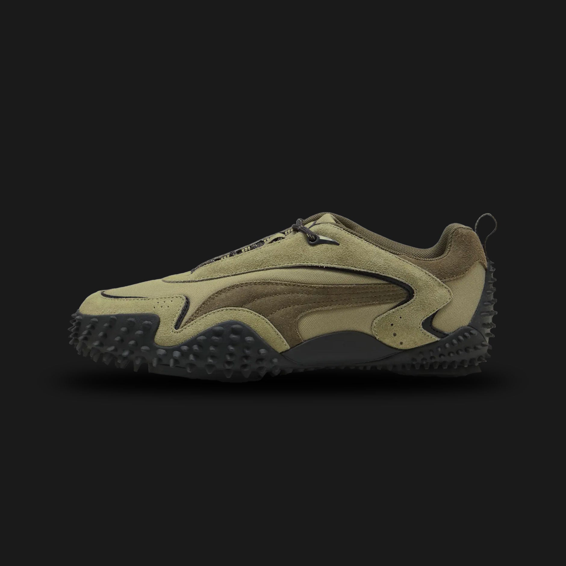 Puma Mostro XC Prime unisex sneakers in Lux Army and Loden Green (404336_05). Features a hybrid, trail-inspired design that elevates the classic Mostro silhouette with a rugged, technical aesthetic. Includes premium leather and textile upper construction, a unique bungee lace system for quick adjustments, and an aggressive, all-terrain rubber outsole for superior traction. Luxuntique guarantees 100% authentic Puma footwear in Sri Lanka.
