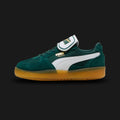 Puma Palermo Moda women's sneakers in Dark Myrtle green and Puma White (401679_01). Features a retro terrace silhouette with a premium Dark Myrtle suede upper and a distinct, exaggerated fold-over Moda tongue. Includes a crisp White Puma formstrip, classic T-toe construction, and a durable retro rubber outsole. Luxuntique guarantees 100% authentic Puma footwear in Sri Lanka.