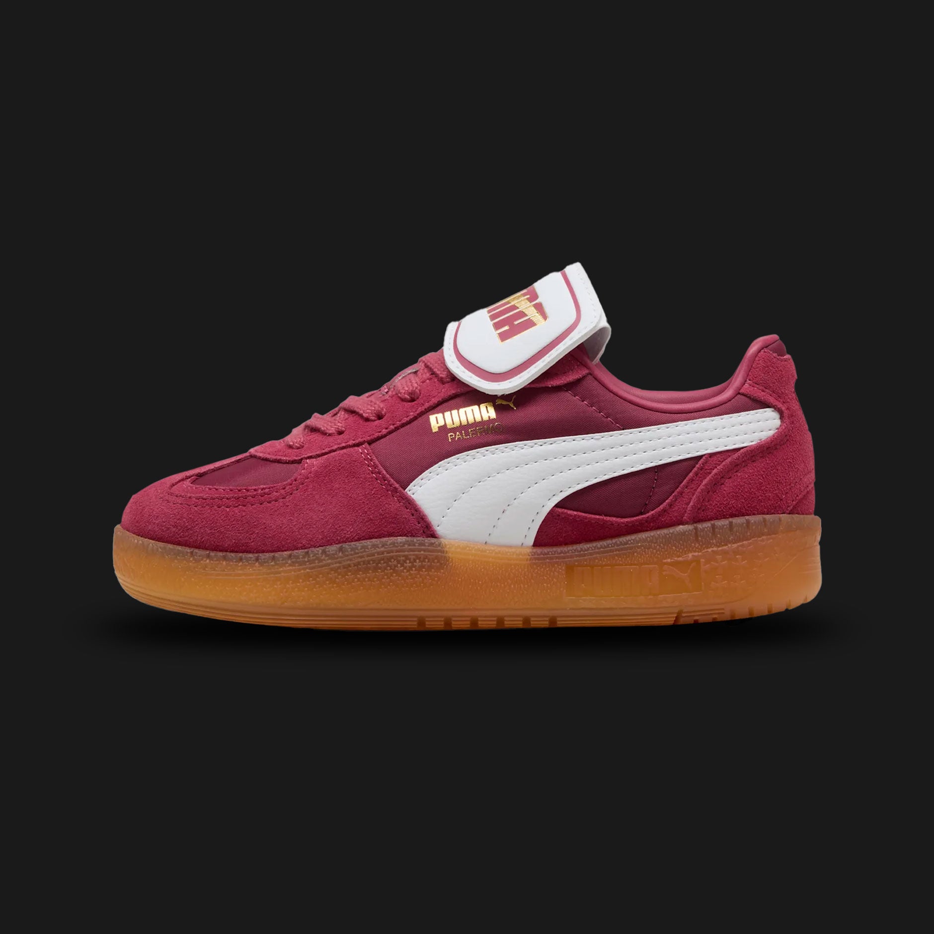 Puma Palermo Moda women's sneakers in Port burgundy and Puma White (401679_02). Features a retro terrace silhouette with a premium Port red suede upper and a distinct, exaggerated fold-over Moda tongue. Includes a crisp White Puma formstrip, classic T-toe construction, and a durable retro rubber outsole. Luxuntique guarantees 100% authentic Puma footwear in Sri Lanka.