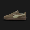 Puma Palermo unisex sneakers in Loden Green and Gum (396463_89). Features a classic terrace silhouette with a premium Loden Green suede upper and signature T-toe construction. Includes classic Puma branding and a retro Gum rubber sole for authentic vintage style and everyday traction. Luxuntique guarantees 100% authentic Puma footwear in Sri Lanka.