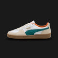 Puma Palermo unisex sneakers in Puma White and Emerald Ice (396464_26). Features a classic terrace silhouette with a premium white leather upper and signature T-toe construction. Includes a vibrant Emerald Ice Puma formstrip, classic gold-foil branding, and a retro Gum rubber sole for authentic vintage style and everyday traction. Luxuntique guarantees 100% authentic Puma footwear in Sri Lanka.
