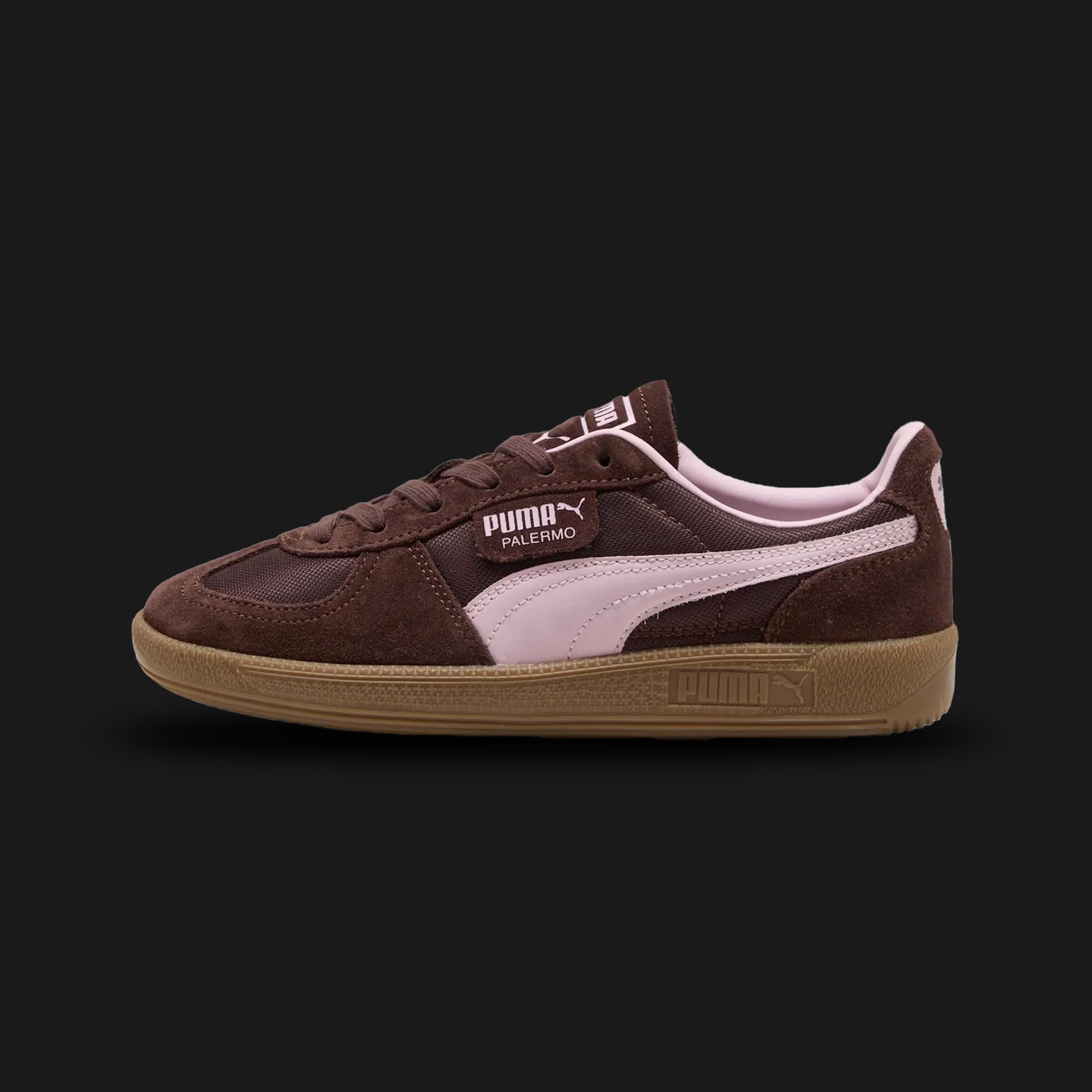 PUMA Palermo Vintage Update Unisex sneakers in Chocolate Brown and Gum (401364_05). Features a premium dark brown suede and leather upper with the signature T-toe construction and gold foil Palermo branding on the lateral flap. Classic gum rubber outsole for an archival terrace look. Luxuntique offers 100% authentic PUMA in Sri Lanka.
