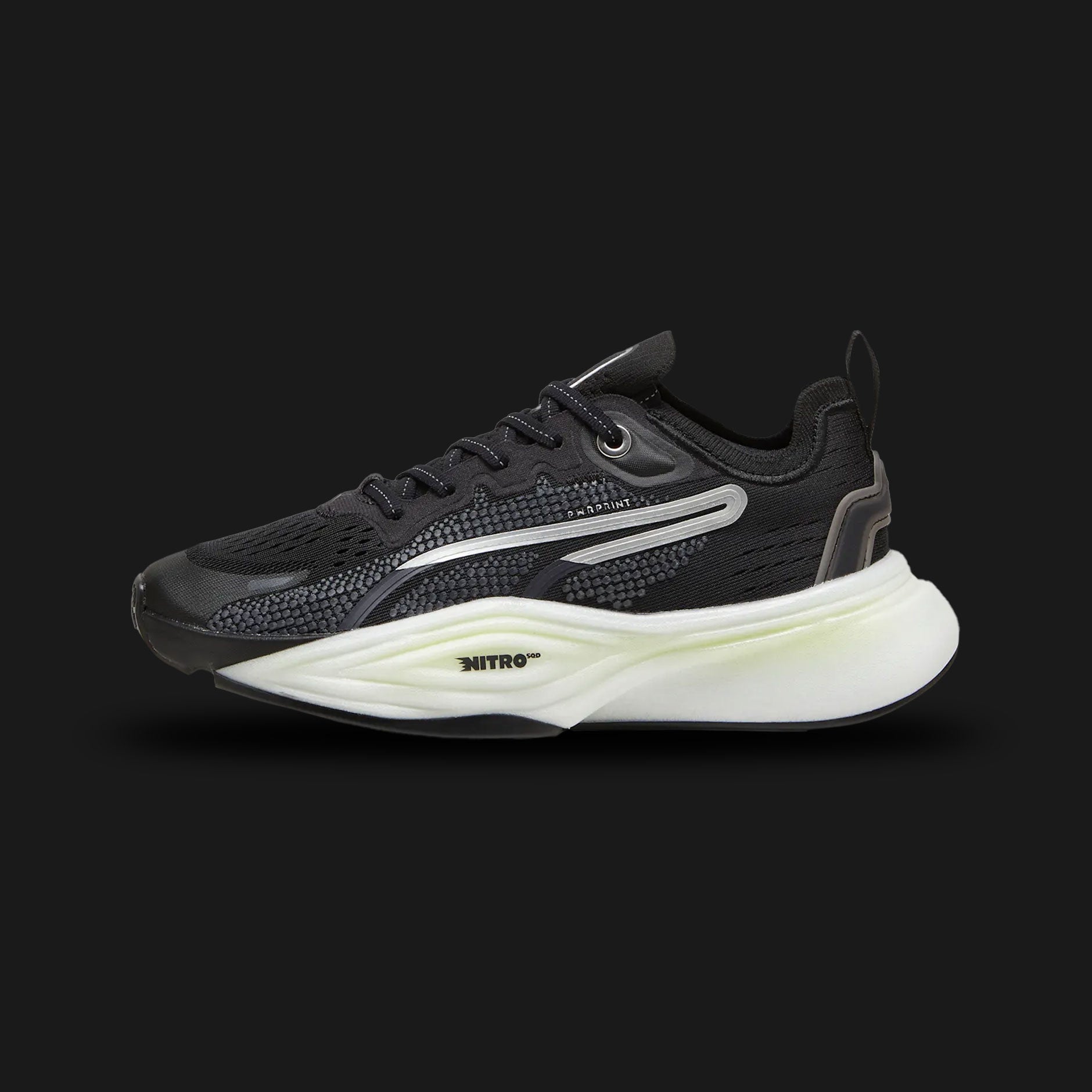 Puma PWR NITRO SQD 2 women's training shoes in Puma Black and Puma White (310147_01). Features a breathable Black engineered mesh upper with a secure heel support system. Includes crisp White Puma branding, a dual-density NITRO SQD foam midsole for lateral stability and explosive cushioning, and a durable PUMAGRIP rubber traction outsole. Luxuntique guarantees 100% authentic Puma footwear in Sri Lanka.