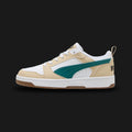Puma Rebound V6 Low sneakers in Toasted Almond, Emerald Ice, and Puma White (392328_61). Features a retro basketball-inspired low-top silhouette with a durable synthetic leather upper in warm Toasted Almond. Includes a perforated toe box, a comfortable SoftFoam+ sockliner, striking Emerald Ice accents, and a classic white rubber cupsole for everyday street wear. Luxuntique guarantees 100% authentic Puma footwear in Sri Lanka.