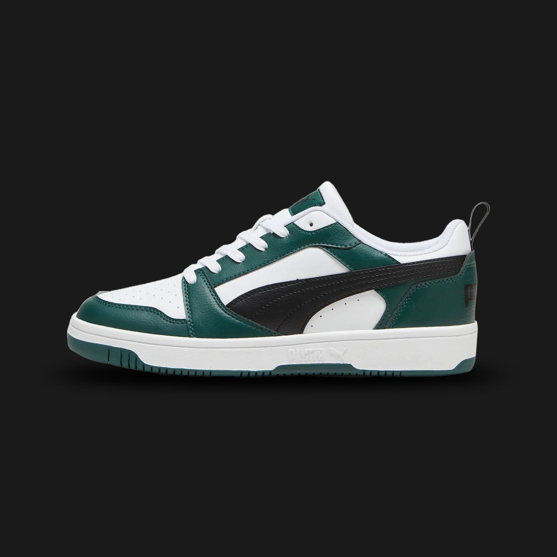 Puma Rebound V6 Low sneakers in Puma White, Puma Black, and Dark Myrtle green (392328_34). Features a retro basketball-inspired low-top silhouette with a durable synthetic leather upper and perforated toe box. Includes a comfortable SoftFoam+ sockliner, striking Dark Myrtle accents, and a classic rubber cupsole for everyday street wear. Luxuntique guarantees 100% authentic Puma footwear in Sri Lanka.