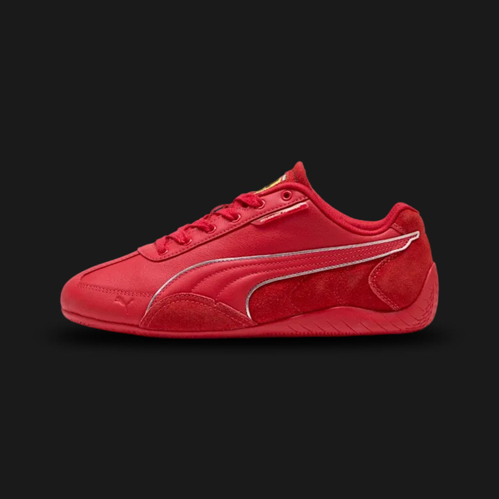 PUMA Scuderia Ferrari HP Speedcat unisex sneakers in Rosso Corsa (Racing Red) and Puma Black (Design Code: 308905-02). Featuring a low-profile silhouette with a premium leather upper, the iconic rounded driver's heel for pedal feel, and the signature Scuderia Ferrari shield on the lateral heel. Luxuntique offers 100% authentic PUMA Motorsport footwear at the lowest price in Sri Lanka.