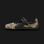 PUMA Speedcat Ballet Snake Print Sneakers for women in Black and Vapor Gray (405326_01). Features a premium black leather upper with textured snakeskin-print Three Stripes and a dainty ballet-flat silhouette. Signature low-profile tire-tread rubber outsole in Vapor Gray. Luxuntique offers 100% authentic PUMA in Sri Lanka.