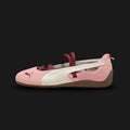 PUMA Speedcat Lovelace Ballet Sneakers for women in Rosy Outlook and Alpine Snow (408178_02). Features a premium pink leather upper with ballet-inspired lace-up detailing, bow accents, and a rounded toe. Signature low-profile tire-tread rubber outsole in Alpine Snow. Luxuntique offers 100% authentic PUMA in Sri Lanka.