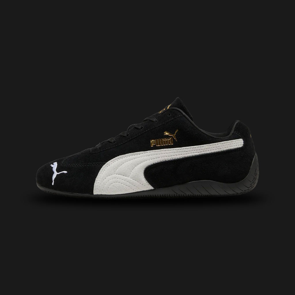PUMA Speedcat OG Unisex sneakers in PUMA Black and PUMA White (398846_01). Features a premium soft black suede upper with a crisp white stitched leather Formstrip and metallic gold foil PUMA branding. Iconic low-profile tire-tread rubber outsole and rounded driver's heel. Luxuntique offers 100% authentic PUMA in Sri Lanka.
