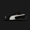 PUMA Speedcat OG Unisex sneakers in PUMA Black and PUMA White (398846_01). Features a premium soft black suede upper with a crisp white stitched leather Formstrip and metallic gold foil PUMA branding. Iconic low-profile tire-tread rubber outsole and rounded driver's heel. Luxuntique offers 100% authentic PUMA in Sri Lanka.