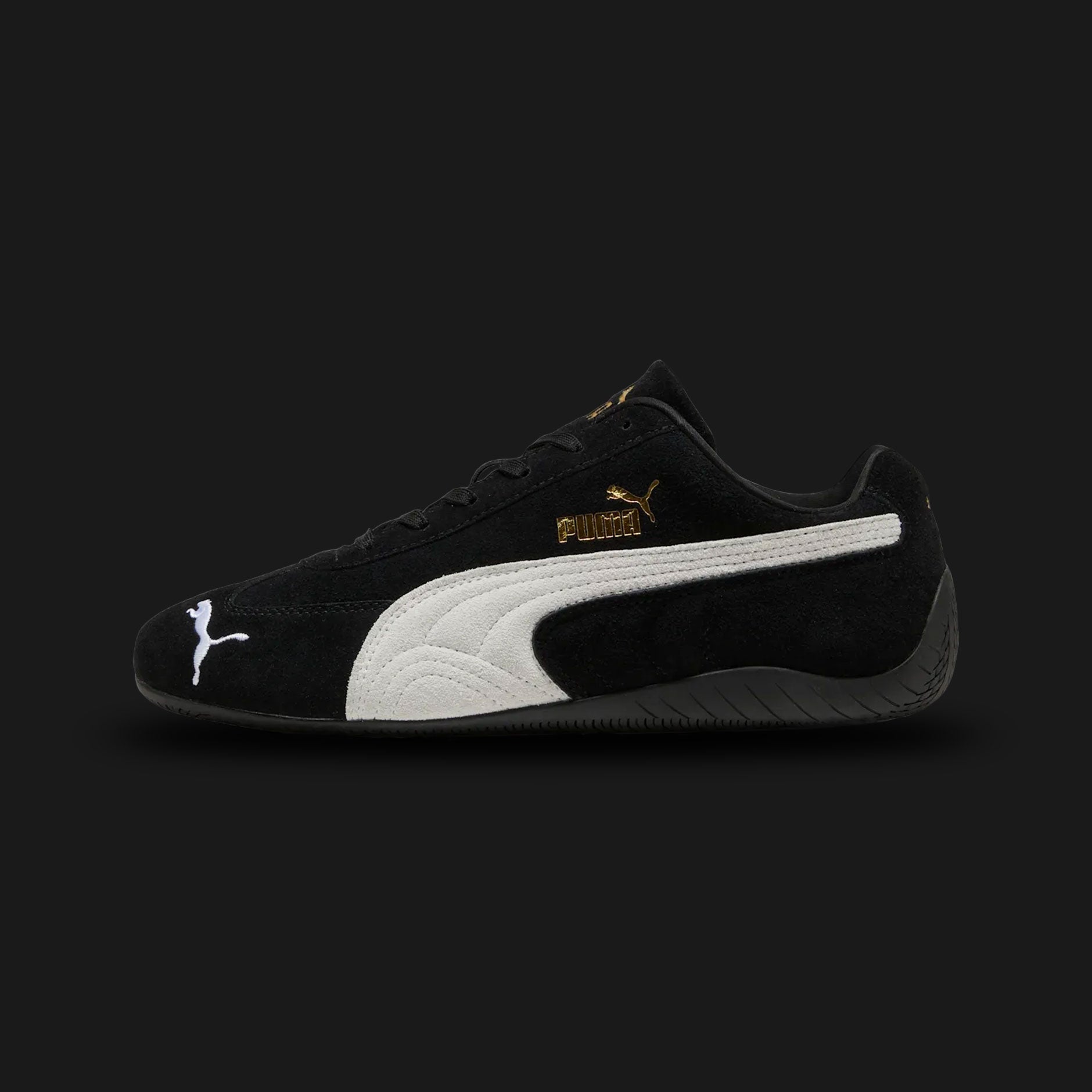 PUMA Speedcat OG Unisex sneakers in PUMA Black and PUMA White (398846_01). Features a premium soft black suede upper with a crisp white stitched leather Formstrip and metallic gold foil PUMA branding. Iconic low-profile tire-tread rubber outsole and rounded driver's heel. Luxuntique offers 100% authentic PUMA in Sri Lanka.
