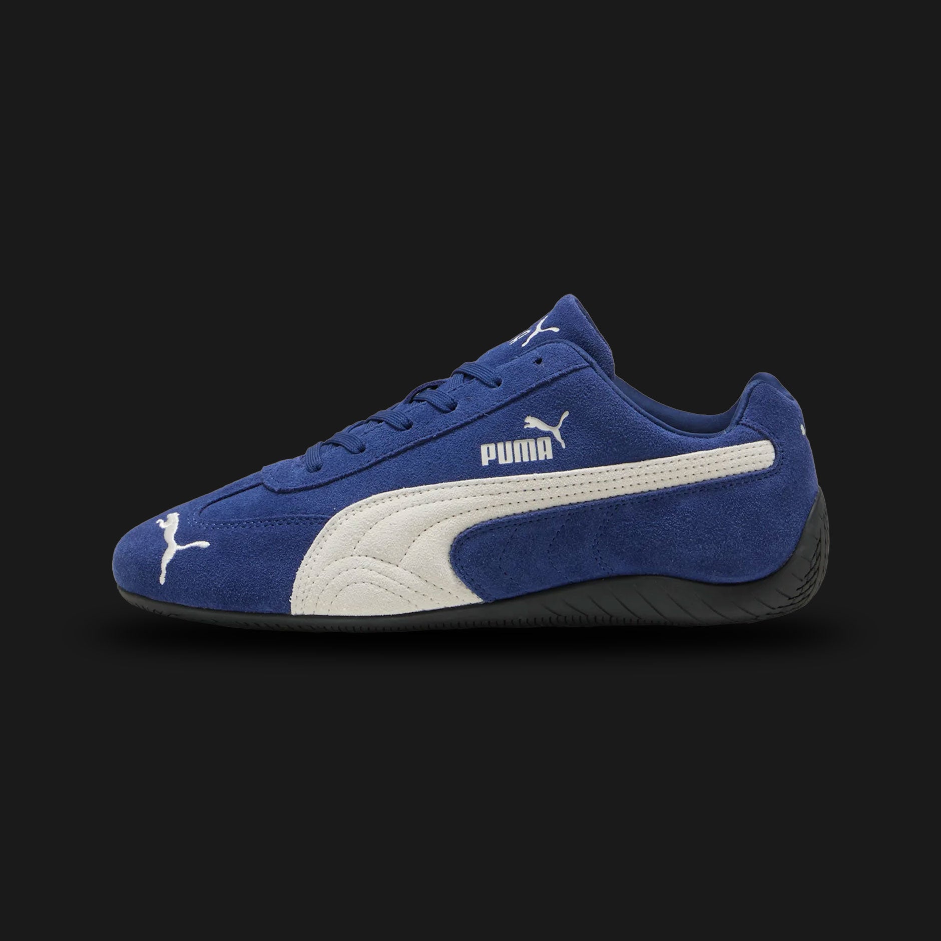 PUMA Speedcat OG Unisex sneakers in Blue Jewel and PUMA Black (398846_87). Features a premium electric blue suede upper with a black stitched leather Formstrip and metallic gold foil PUMA branding. Iconic low-profile tire-tread rubber outsole and rounded driver's heel. Luxuntique offers 100% authentic PUMA in Sri Lanka.