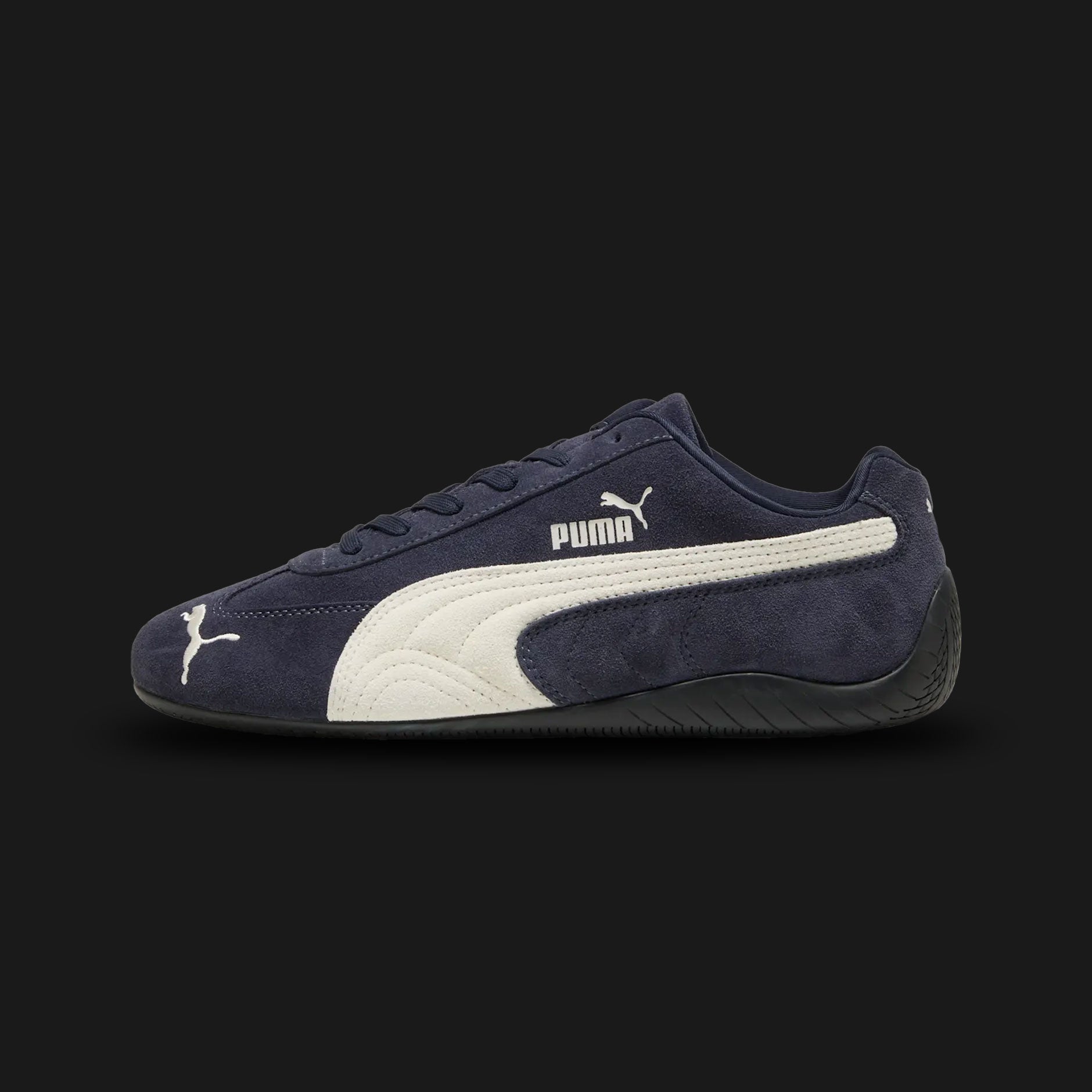 PUMA Speedcat OG Unisex sneakers in New Navy blue and Warm White (398846_38). Features a premium deep navy suede upper with a stitched warm white Formstrip and metallic gold foil PUMA branding. Iconic low-profile tire-tread rubber outsole and rounded driver's heel. Luxuntique offers 100% authentic PUMA in Sri Lanka.