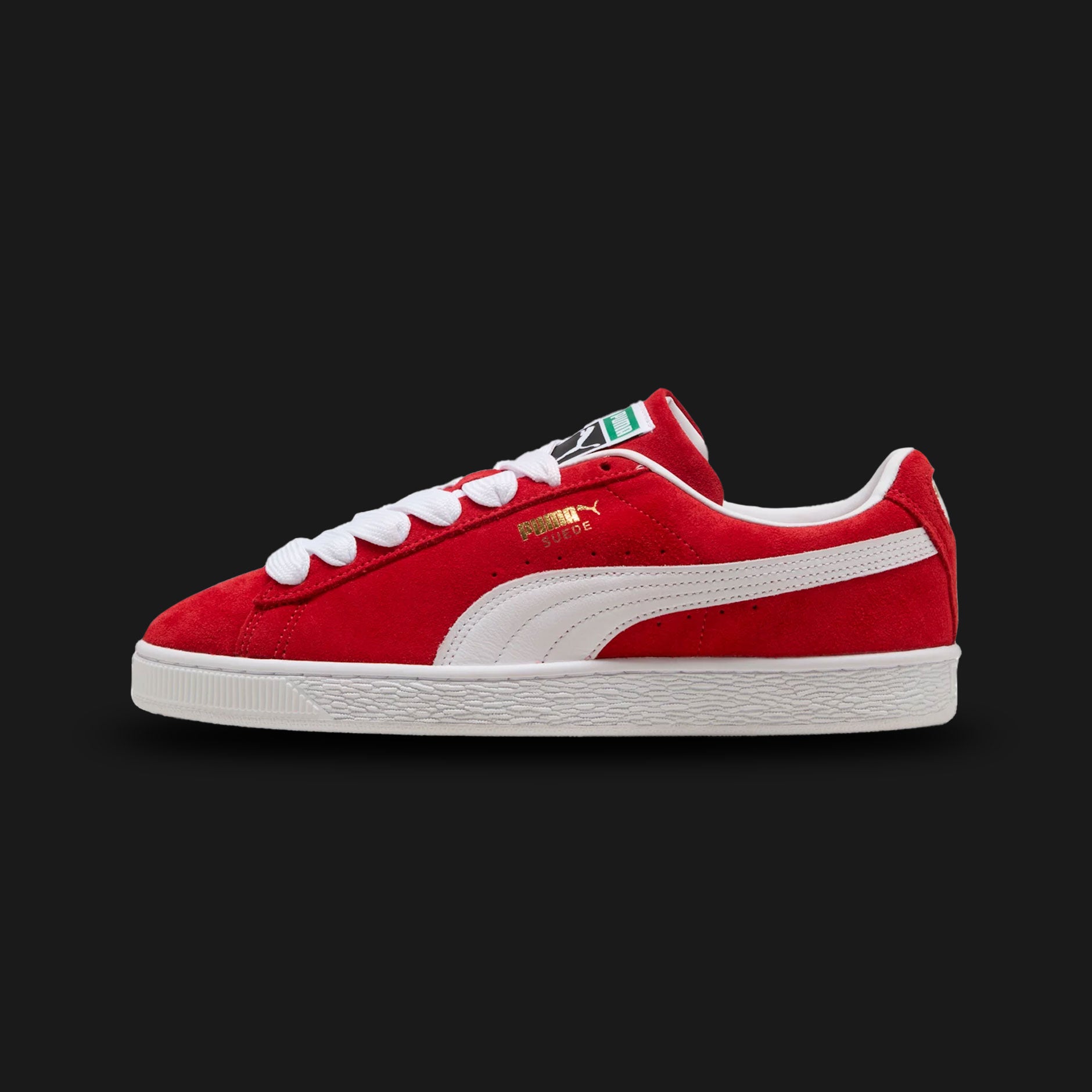 PUMA Suede Classic Unisex sneakers in For All Time Red and PUMA White (399781_02). Features a premium vibrant red suede upper with a crisp white leather Formstrip and metallic gold foil PUMA branding. Finished with the signature textured white rubber midsole. A 1968 archival icon. Luxuntique offers 100% authentic PUMA in Sri Lanka.