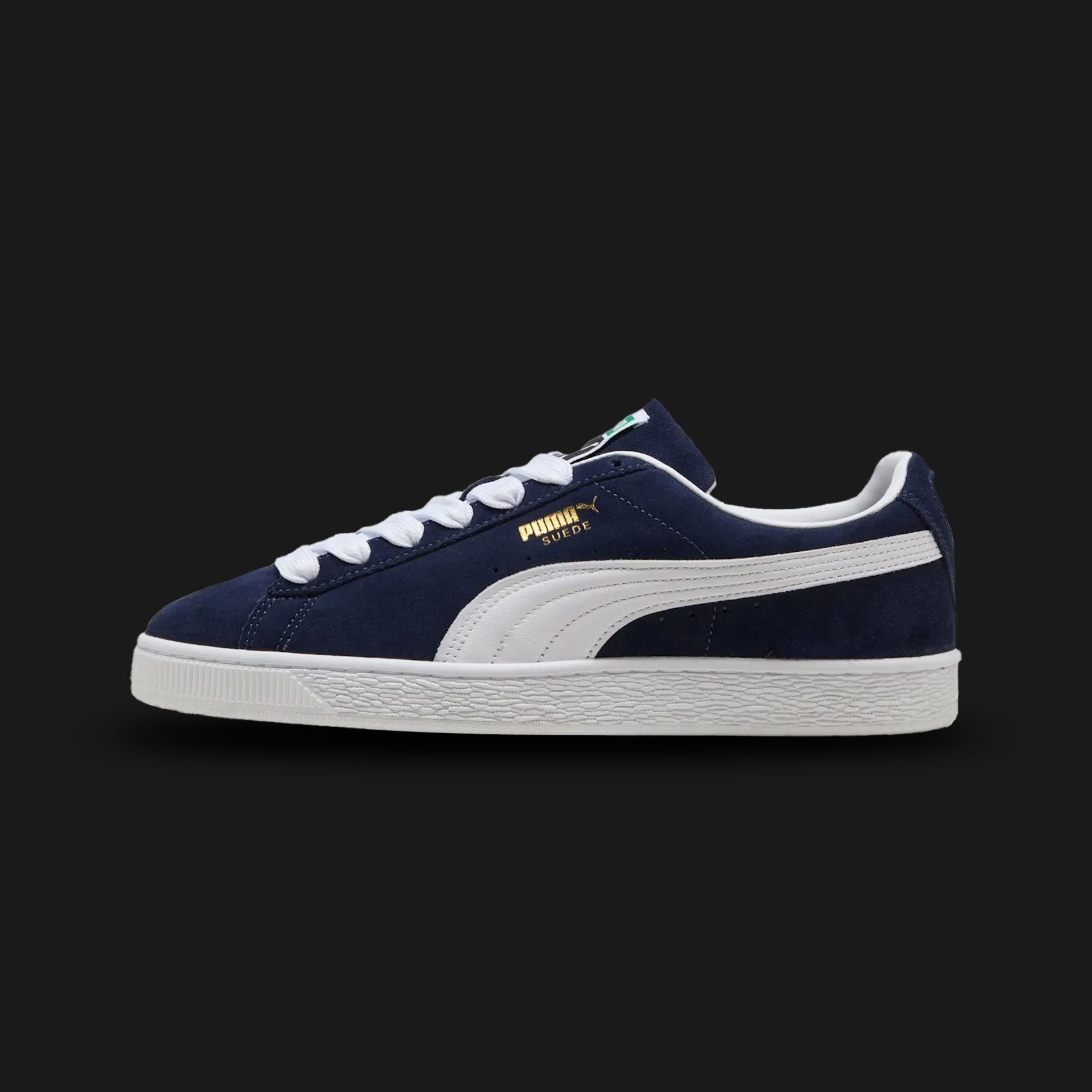PUMA Suede Classic Unisex sneakers in PUMA Navy and PUMA White (399781_03). Features a premium deep navy suede upper with a crisp white leather Formstrip and metallic gold foil PUMA branding. Finished with the signature textured white rubber outsole. A 1968 archival icon. Luxuntique offers 100% authentic PUMA in Sri Lanka.
