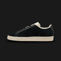 Puma Suede Icons unisex sneakers in Puma Black and Frosted Ivory (405345_01). Features a classic low-top vintage silhouette with a premium Puma Black suede upper and a contrasting Frosted Ivory Puma formstrip. Includes flat laces, iconic gold-foil Puma branding, and a durable retro rubber cupsole. Luxuntique guarantees 100% authentic Puma footwear in Sri Lanka.